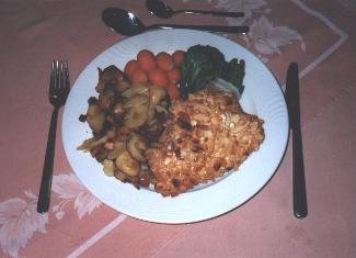Putenschnitzel in Mandel paniert